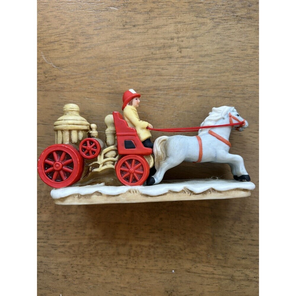 Vintage 1987 Lefton Christmas Fireman Sleigh Figurine.